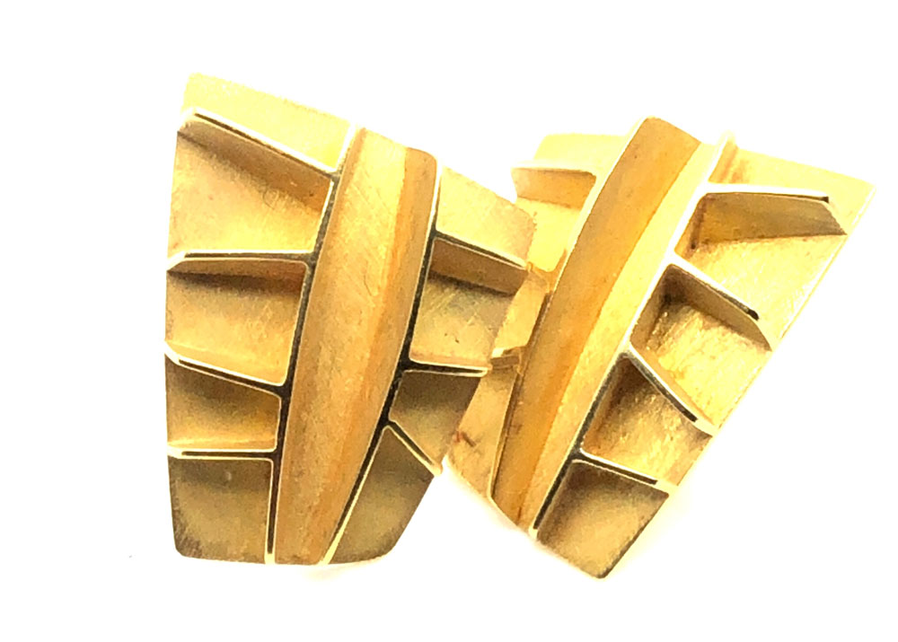 pair of gold earrings