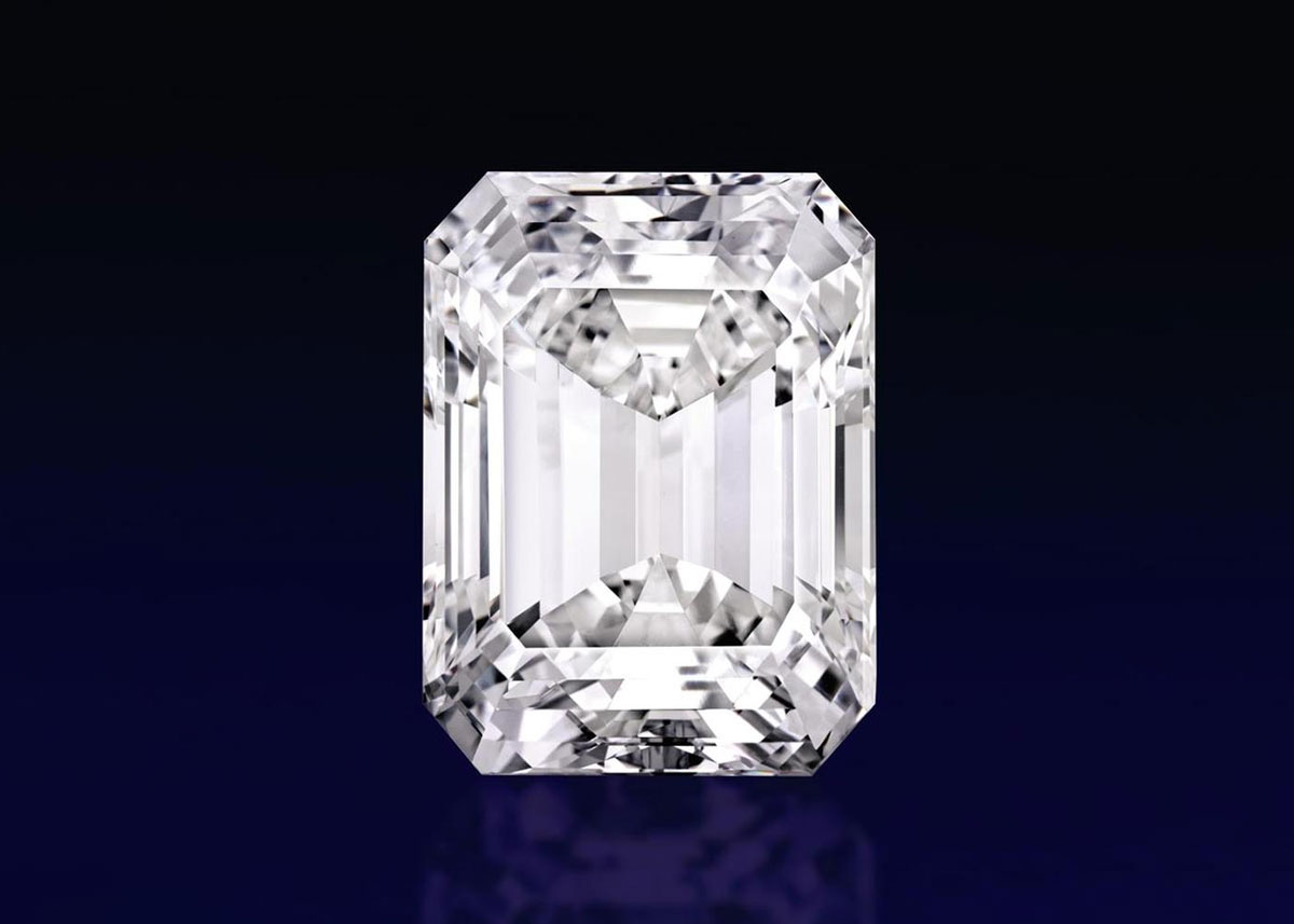 radiant cut diamond on dark blue background