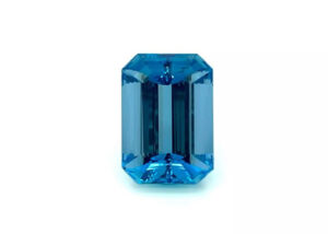 Vivid blue Aquamarine gemstone on white background